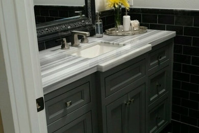 Small transitional 3/4 bathroom photo in San Diego with flat-panel cabinets, brown cabinets, a two-piece toilet, beige walls and a drop-in sink