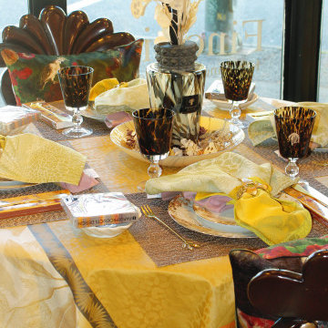Summer table setting showcasing French cotton jacquard table linen
