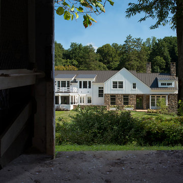 American Farmhouse with Board and Batten and Rustic Stone