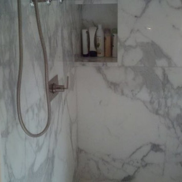 Calcutta Gold Marble Bathroom and Closet