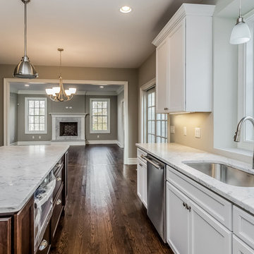 Direct Depot | Two-Toned White Kitchen with Medium Stain Island