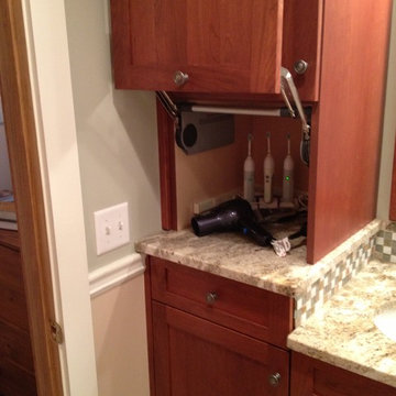 Bathroom appliance garage with outets
