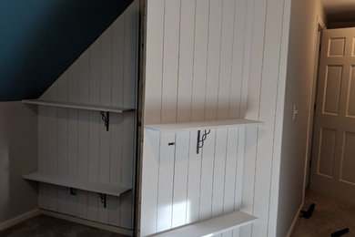 Example of a transitional home office design in Raleigh