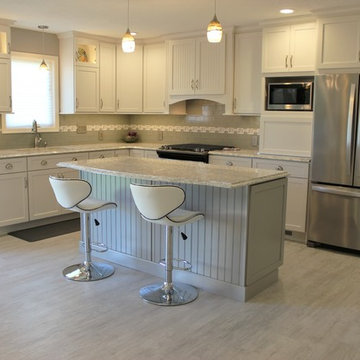 Alpha, IL White and Gray Kitchen with Hidden Laundry and Raised Dishwasher