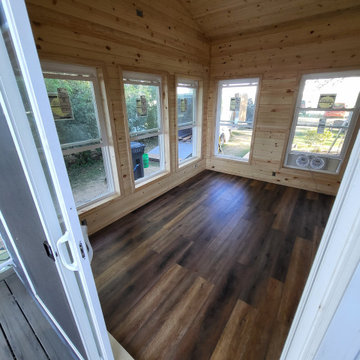 Lake Addition Interior Pine Siding with a premium vinyl plank flooring