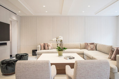 Example of a trendy living room design in New York with a wall-mounted tv