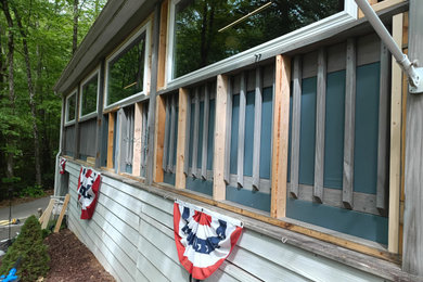 Example of a classic home design design in Charlotte