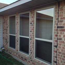Single Hung Beige Windows - Windows