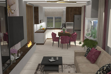 На фото: объединенная гостиная комната с серыми стенами, полом из керамогранита, горизонтальным камином и телевизором на стене
