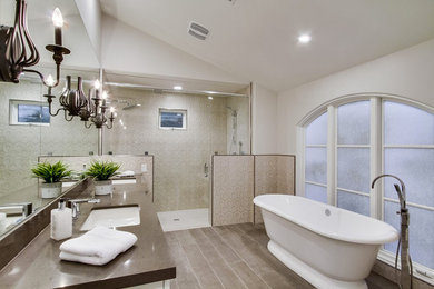 Mid-sized transitional master beige tile and ceramic tile porcelain tile and gray floor bathroom photo in San Diego with white cabinets, white walls, an undermount sink, quartz countertops, a hinged shower door, a one-piece toilet and gray countertops