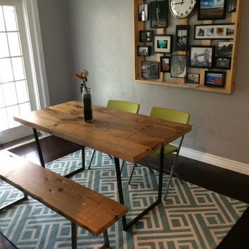 Reclaimed wood table in a Small dining room