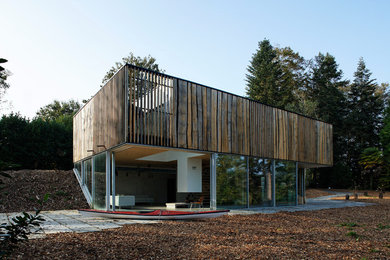 Exemple d'une façade de maison tendance.