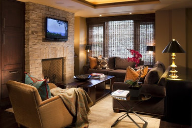 Example of an arts and crafts family room design in Denver