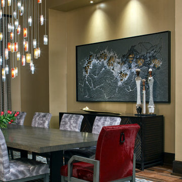 Custom glass lighting enhancing a refined dining room setting