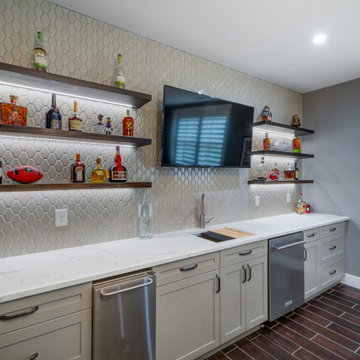 GOLF SIMULATOR, WINE CELLAR, AND BASEMENT BAR