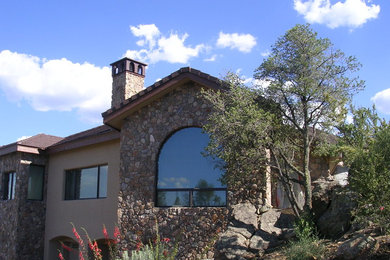 Example of a huge tuscan home design design in Phoenix