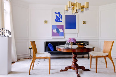 Photo of a contemporary dining room in DC Metro with white walls.
