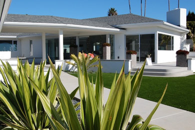 This is an example of a large contemporary full sun side yard concrete paver landscaping in San Diego.