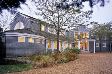 Mid-sized beach style gray two-story wood exterior home photo in Boston with a shingle roof