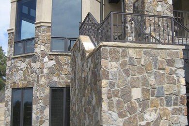 Rustic exterior home idea in Denver