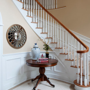 Entryway - large eclectic medium tone wood floor entryway idea in Other with brown walls and a white front door