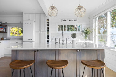 Example of a beach style kitchen design in Vancouver