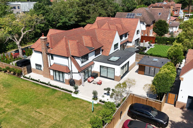 White traditional two floor house exterior in London.
