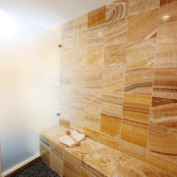 Warm Shower Bathroom with Patterned Shower Door Glass