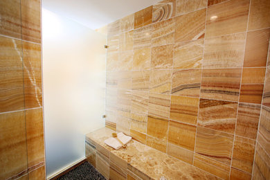 Inspiration for a large modern master corner shower remodel in Minneapolis with a hinged shower door