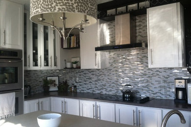 Example of a mid-sized trendy kitchen design in Austin