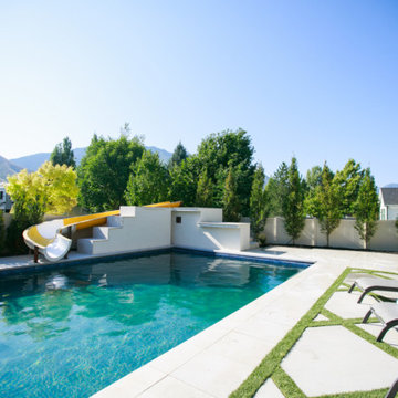 Pool With Waterfall And Slide