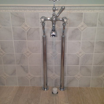 Claw foot tub faucet