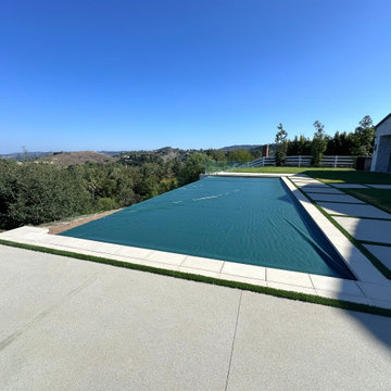 Jim Bredger Infinity edge pool and spa with atomatic cover