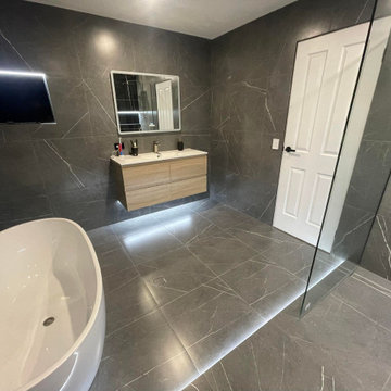 Black Marble Look Bathroom by Dream Tiling