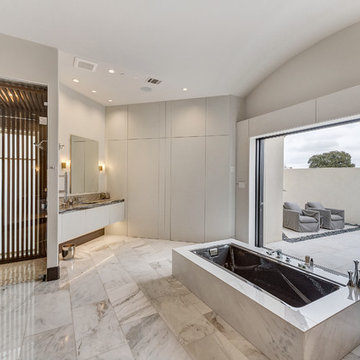 Contemporary Home with Wall of Glass overlooking Golf course