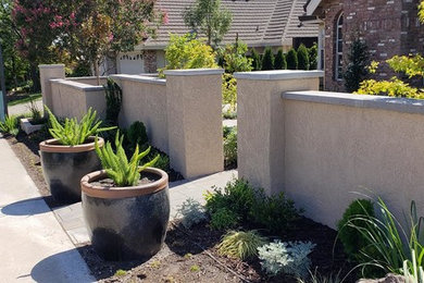 Inspiration for a traditional front yard stone water fountain landscape in Sacramento.