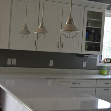 Medallion White Icing Cabinetry with Beadboard doors