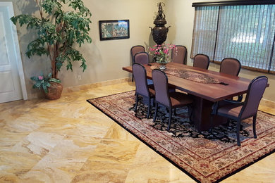 This is an example of a mid-sized transitional dining room in Miami.