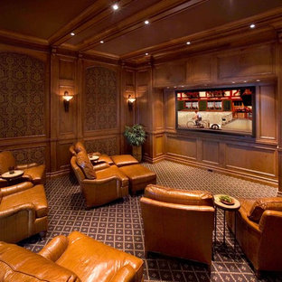 Home theater - mediterranean enclosed carpeted and multicolored floor home theater idea in Philadelphia with multicolored walls and a wall-mounted tv