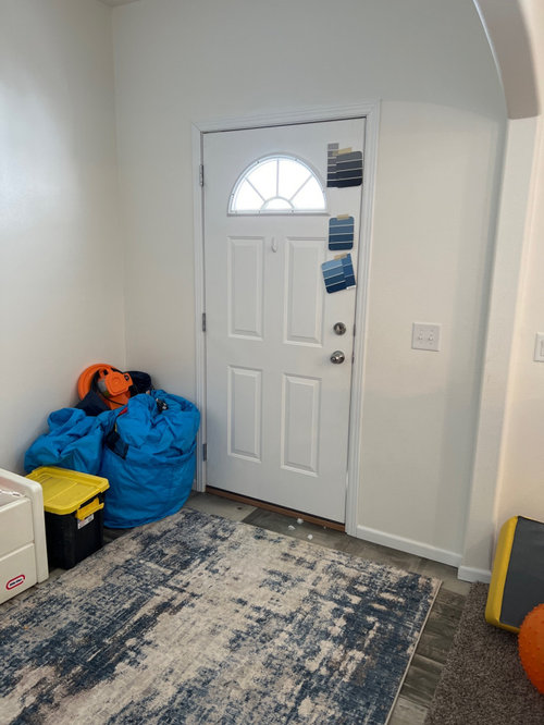 should I paint the inside of my front door ? if so what color?