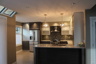 Example of a mid-sized minimalist u-shaped laminate floor and beige floor open concept kitchen design in Vancouver with a double-bowl sink, flat-panel cabinets, white cabinets, granite countertops, multicolored backsplash, matchstick tile backsplash, stainless steel appliances and a peninsula