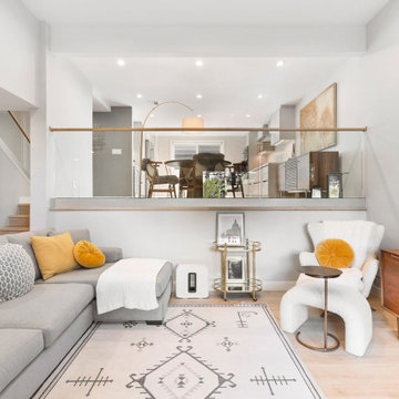Split-Level Living Space with Glass Guardrail Detail
