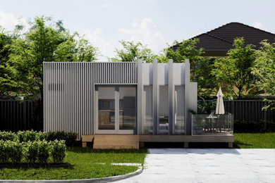 This is an example of a small contemporary home design in Gold Coast - Tweed.