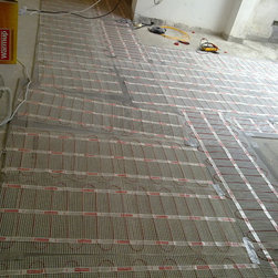 House at Discovery Bay - floor area is with 'Warmup' underfloor heating system - Bath Products