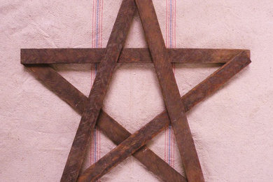 Star wall hanging made of reclaimed old tobacco lath