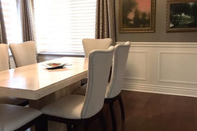 Example of a transitional dining room design in Montreal