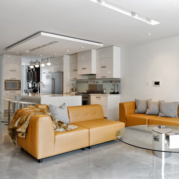 White Kitchen with Concrete Flooring