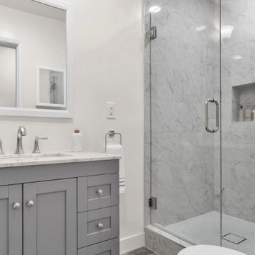 Modern Gray Vanity & Glass Shower with Marble Tile – Irvine Bathroom Upgrade