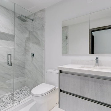 Modern complete renovation with custom wall panel and bedroom sets