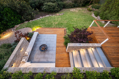 Large beach style backyard full sun garden in Melbourne.